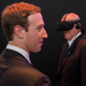 Facebook founder Mark Zuckerberg, seen here alongside Peruvian President Pedro Pablo Kuczynski trying on an Oculus headset at Facebook's booth at the Asia-Pacific Economic Corporation Summit in Lima in November 2016.